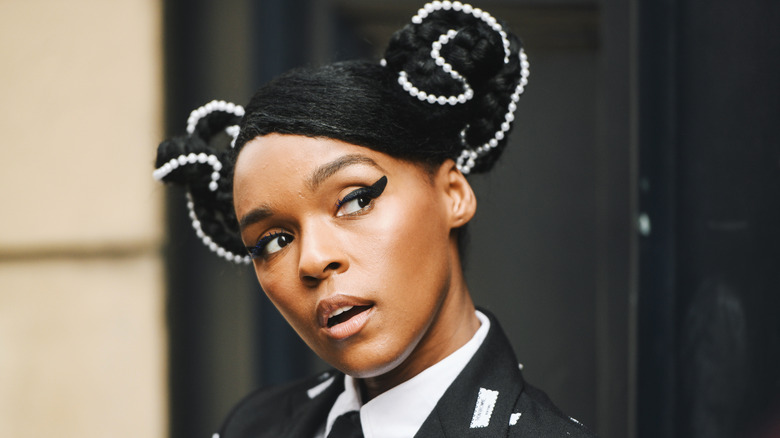 Janelle Monae posing