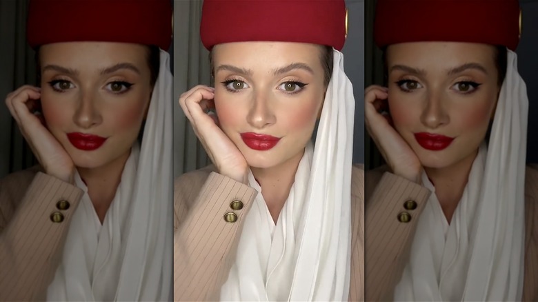 Emirates air hostess posing 