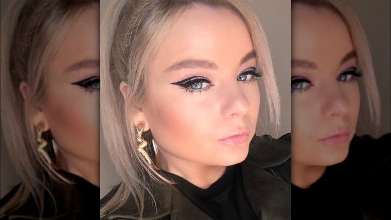 A woman with cut-crease eyeliner
