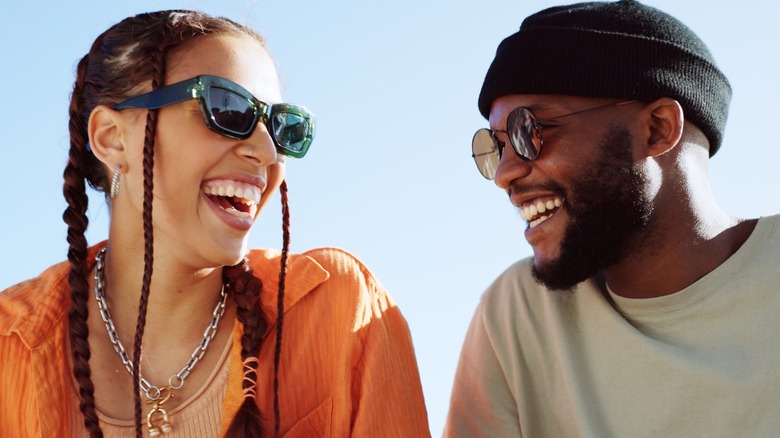 Man and woman laughing together