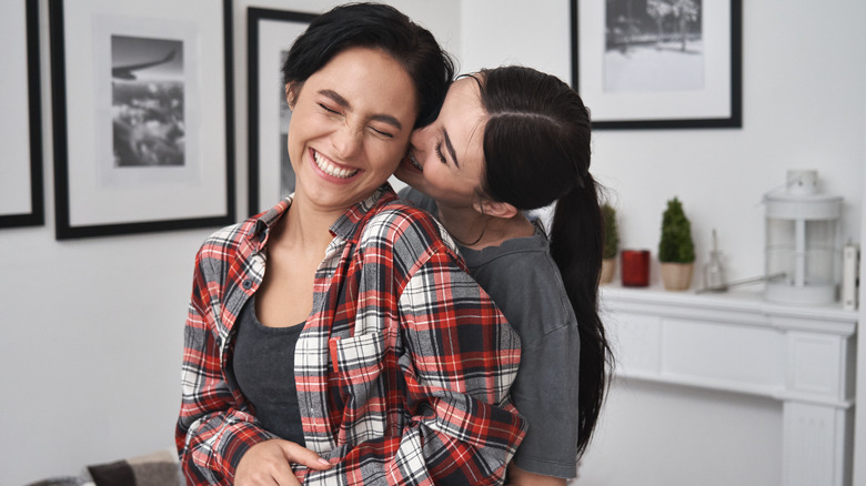 couple hugging and kissing 