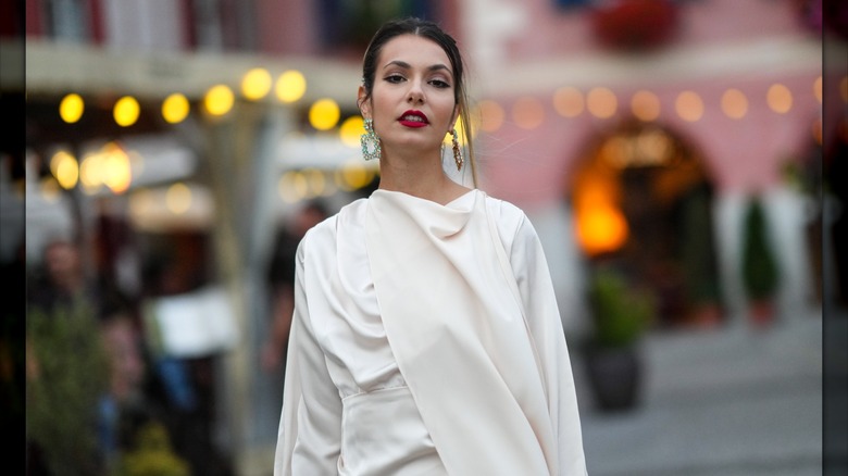 Woman with white dress and lipstick