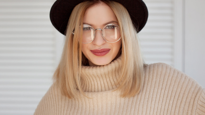 Woman in oversized sunglasses