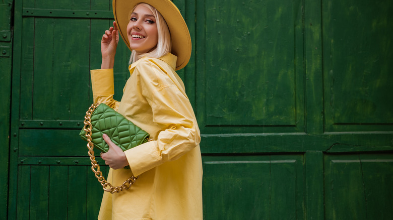 Woman in yellow shirt dress