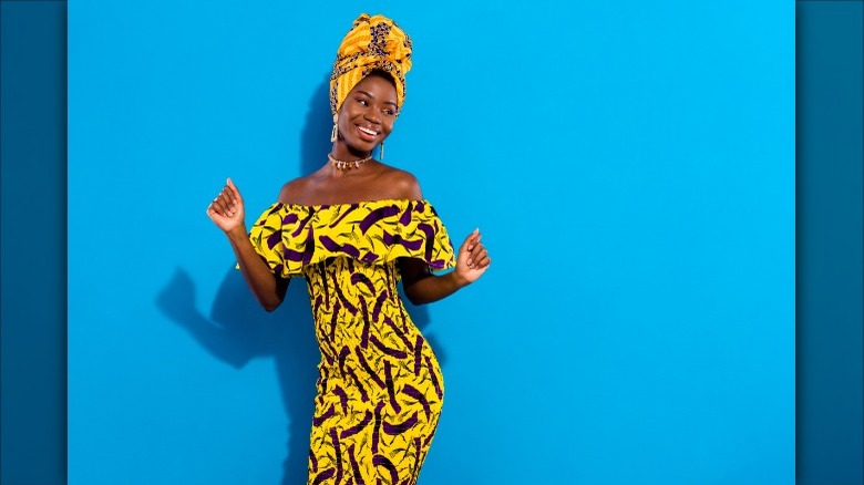 Woman in colorful strapless dress