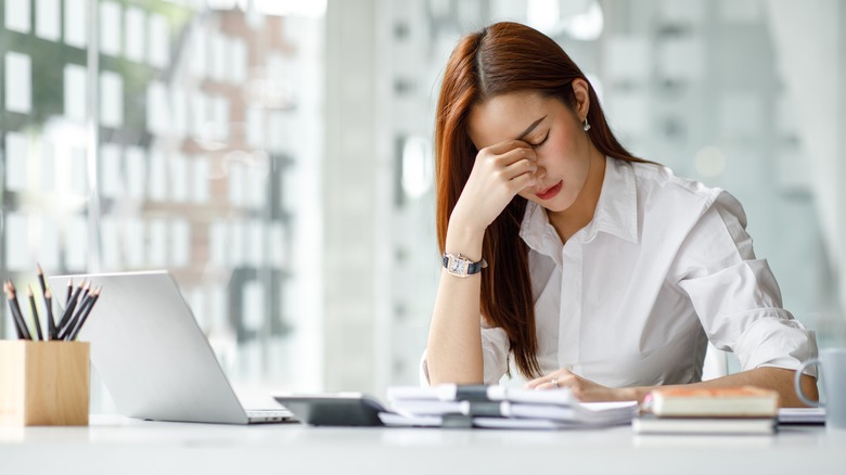 Woman stressed at work