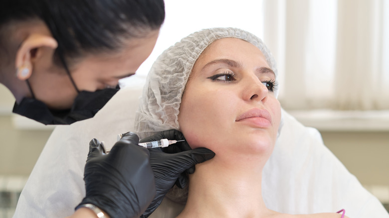 Woman getting jowl fillers