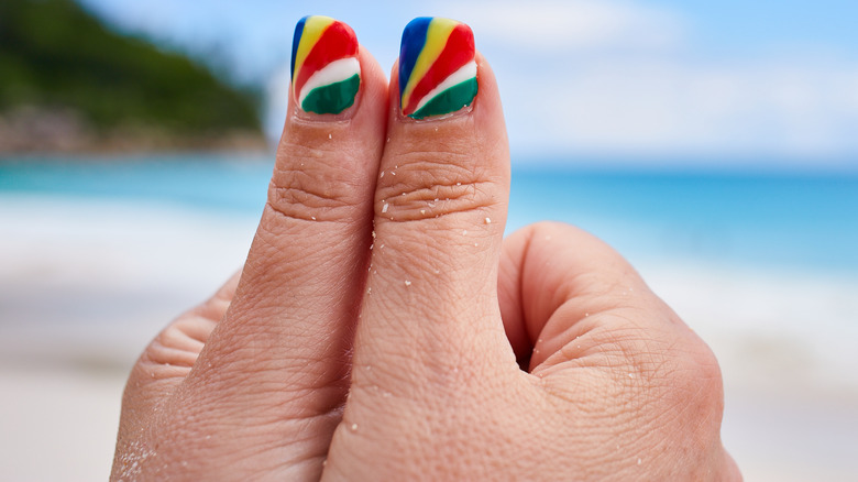 Colorful nails on the beach