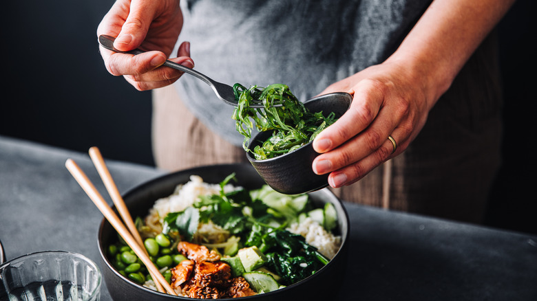 woman eating a salad