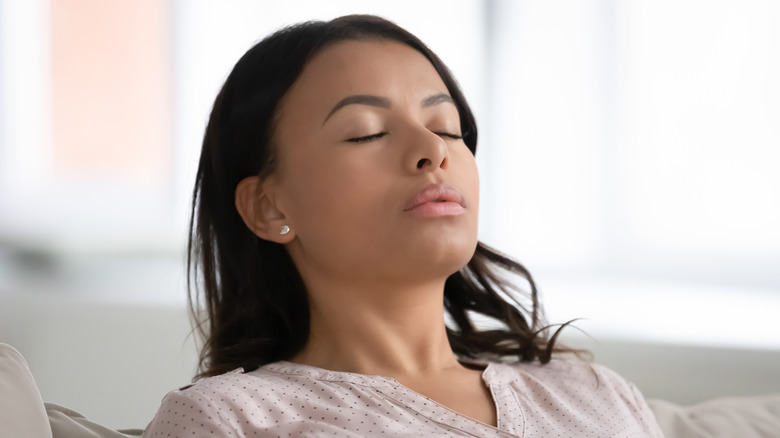 woman deep breathing