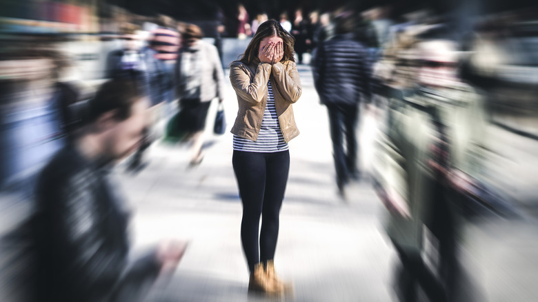 woman feeling overwhelmed