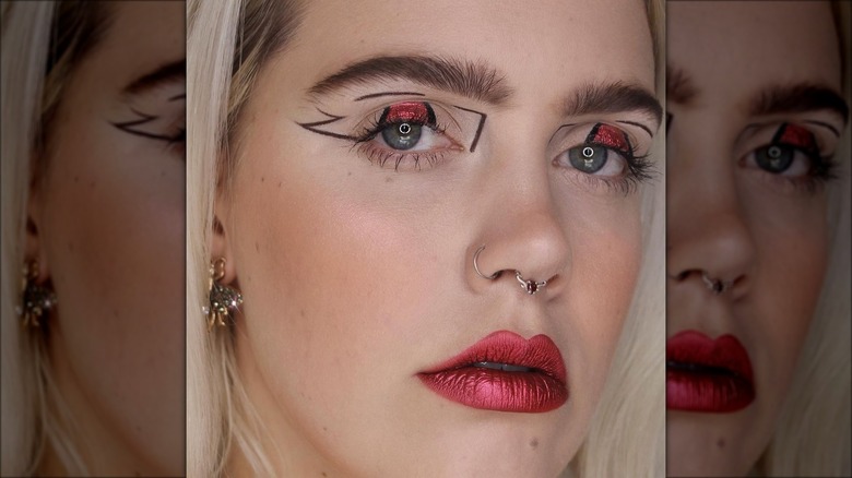 A woman with red makeup