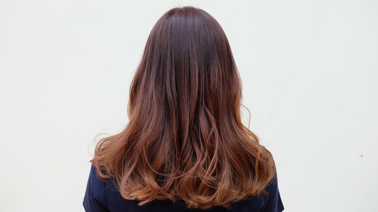 woman with dark mushroom hair