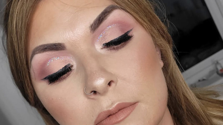 woman with glitter cut crease