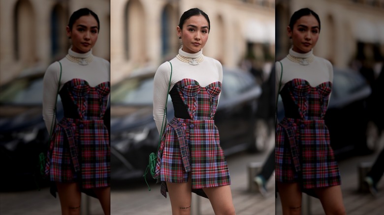 woman in plaid mini dress