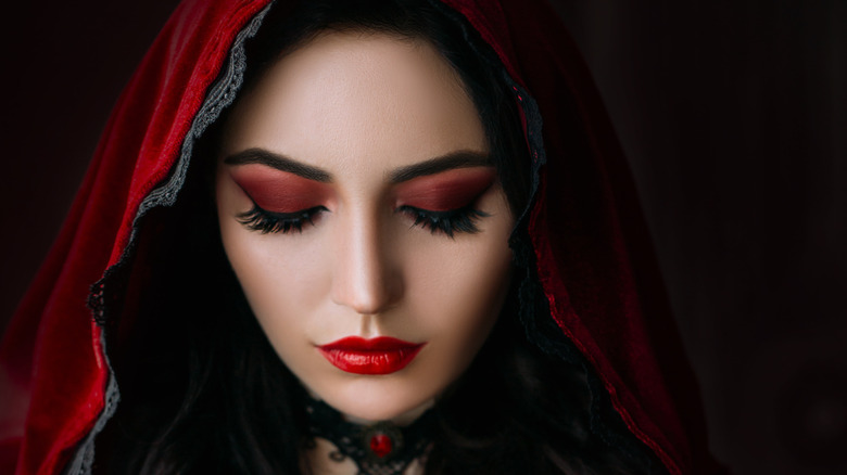 person with red makeup