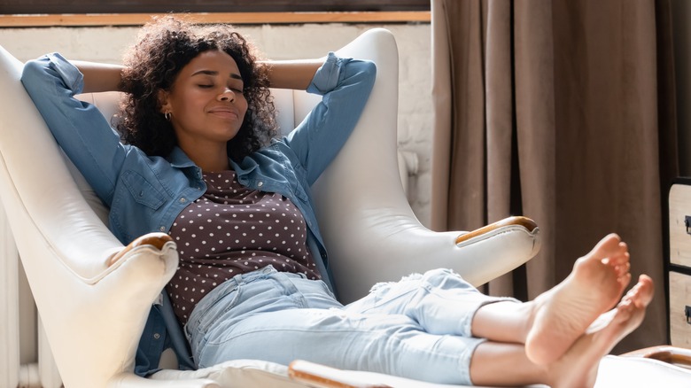 woman relaxing in chair