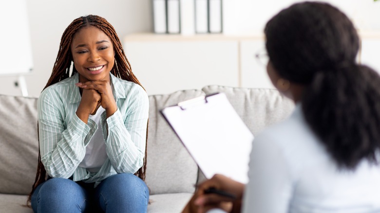 woman meeting with therapist