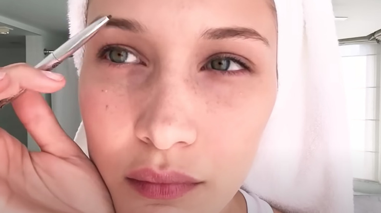 Bella Hadid filling in brows