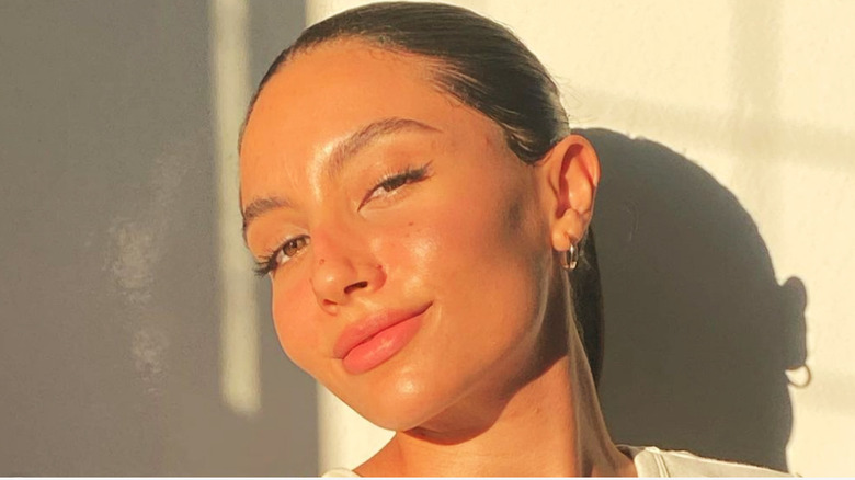 young woman smiling with natural make-up