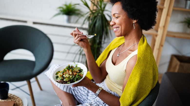 Woman eating a salad