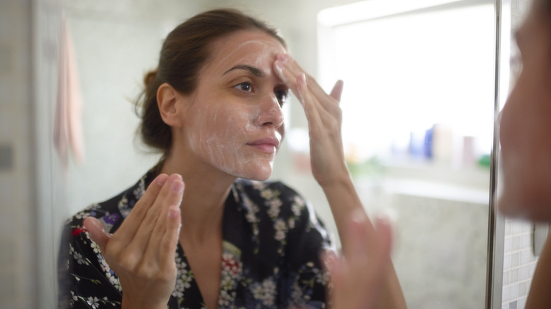 woman using salicylic acid wash