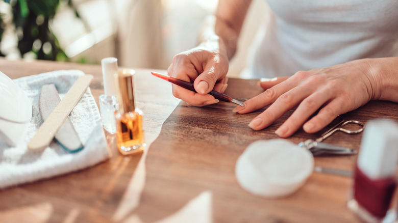 woman caring for cuticles