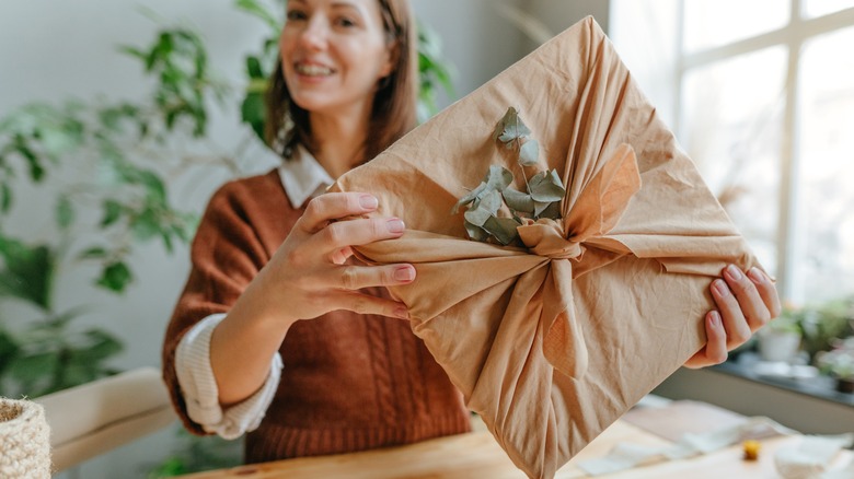 woman holding a gift