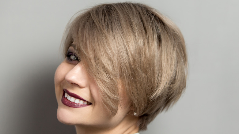 Woman with blond wedge bob
