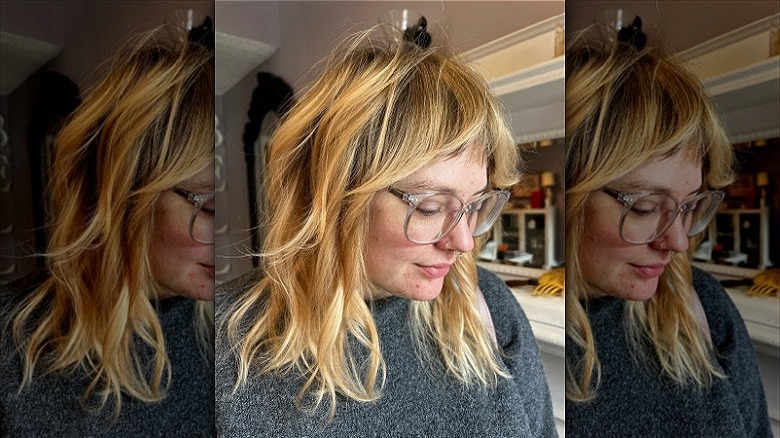 woman with shaggy curtain bangs