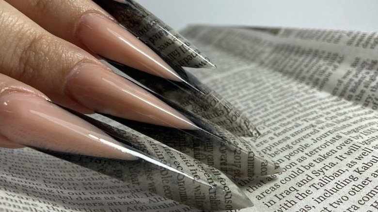 Newspaper edge nails