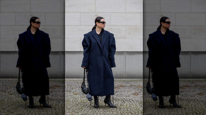 woman wearing oversized coat