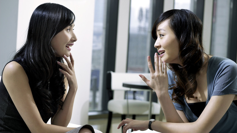 Two women talking 