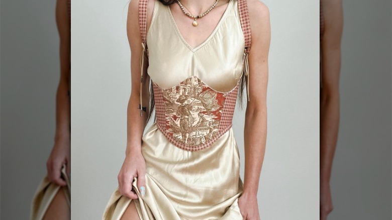 Woman wearing a vintage corset top