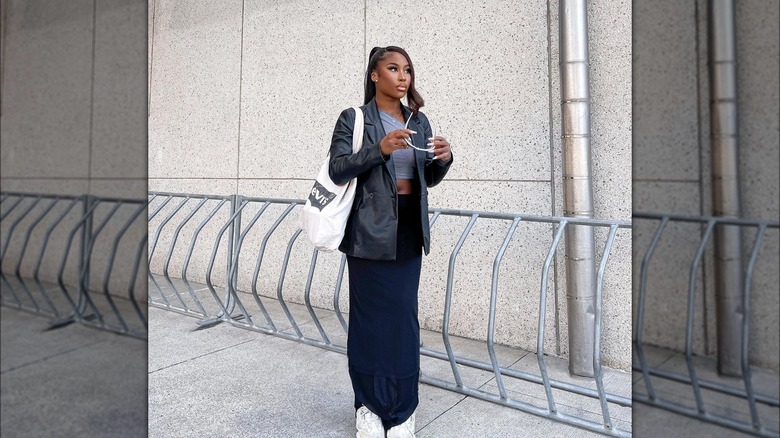 Girl wearing a leather blazer with a column skirt