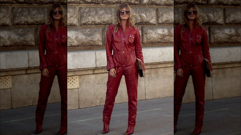 woman wearing red leather jumpsuit