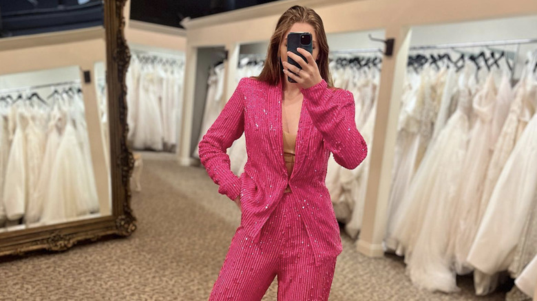 woman in pink sequin suit