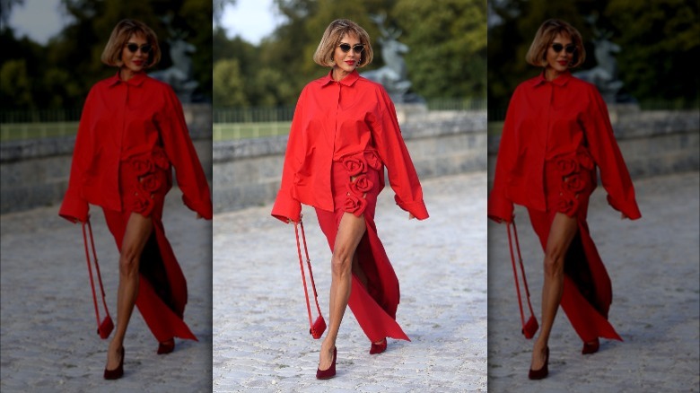 Nicole Ari Parker wearing fashionable red outfit