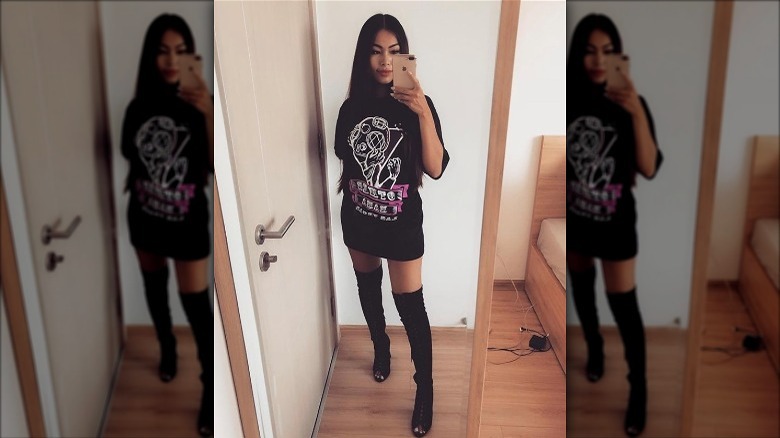 oversized t-shirt with knee-high boots