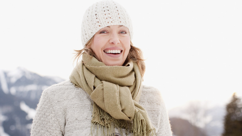 Woman in winter hat and scarf