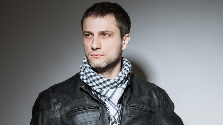 Man in leather jacket with neckerchief