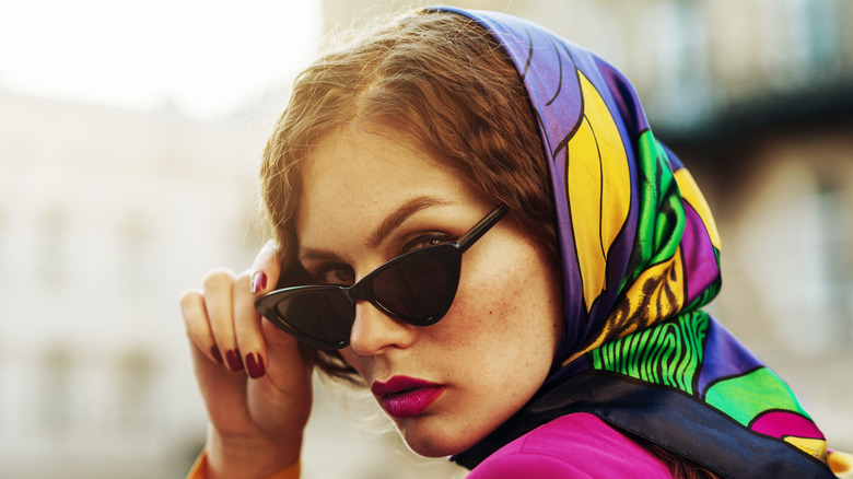 A woman wearing scarf on head