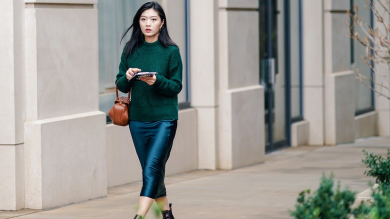 Green sweater and slip skirt outfit