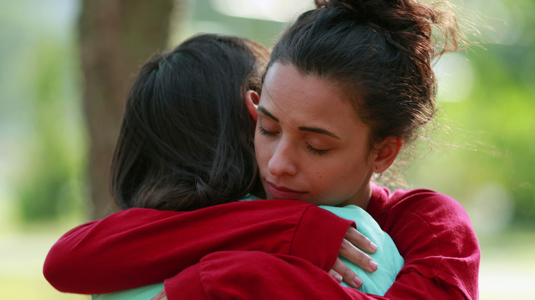 two women hugging