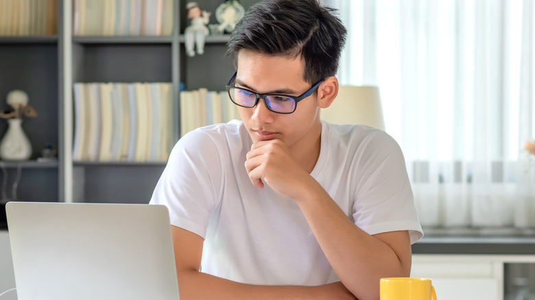 man reading online