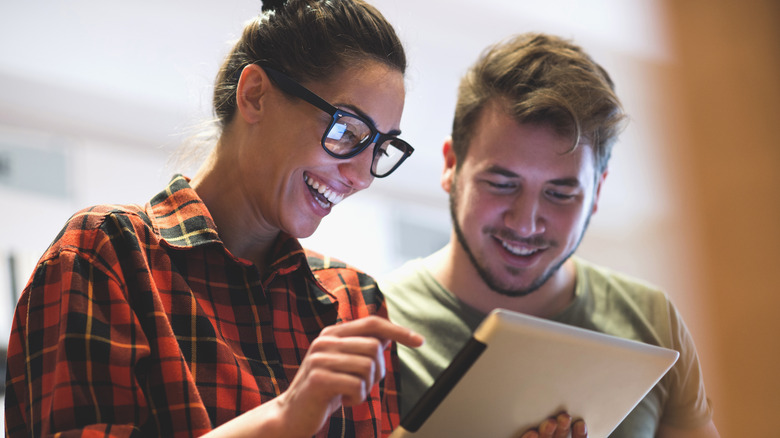 Two people with computer