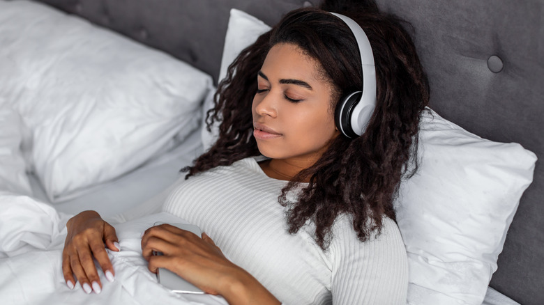 Woman smiling in bed