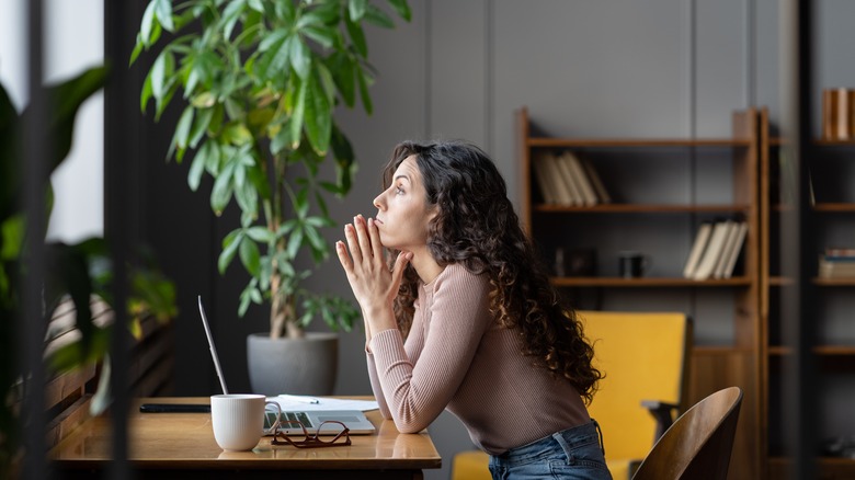 Stressed woman at desk