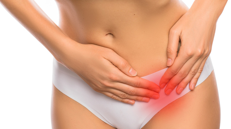 Woman pelvic pain red