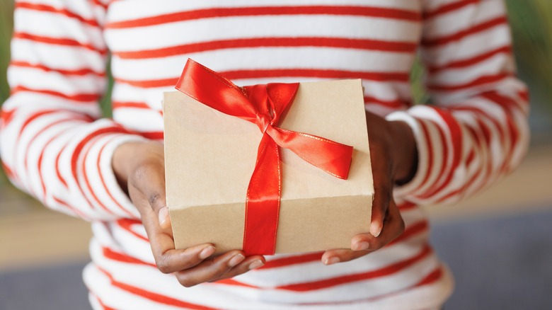 woman holding gift